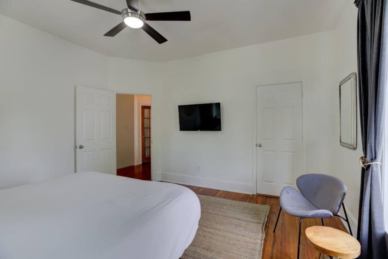 Queen bedroom with smart TV for ultimate downtime.