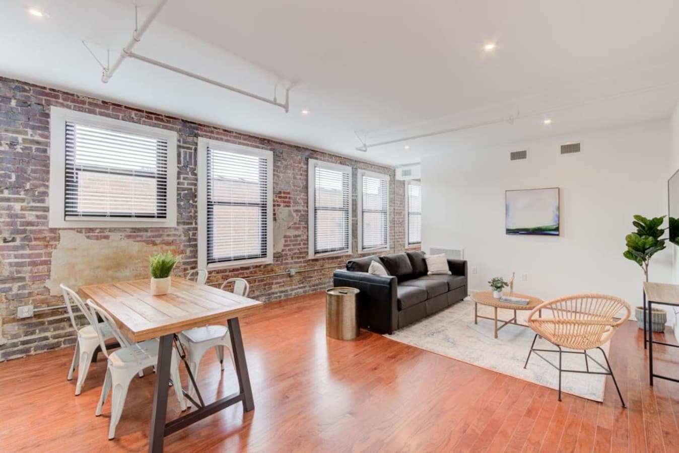 A spacious living area—a comfy sitting spot for Netflix and chill.  A 4-seater table to enjoy a tasty meal, have a coffee, or get some work done. Reap the daily benefits of natural light and enjoy the “sunshine vitamin.”