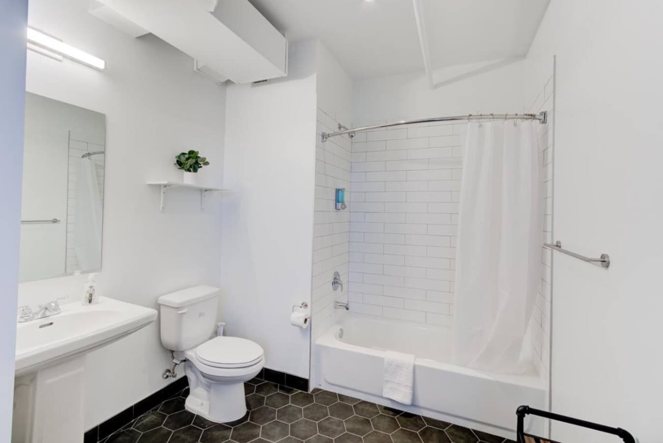 Full-size bathroom with tub- you will have all the essentials you’ll need for your stay from soap, shampoo, and plenty of fresh, clean white towels. Clean off your day’s stress and anxiety. Enjoy a nice, relaxing, warm bath.