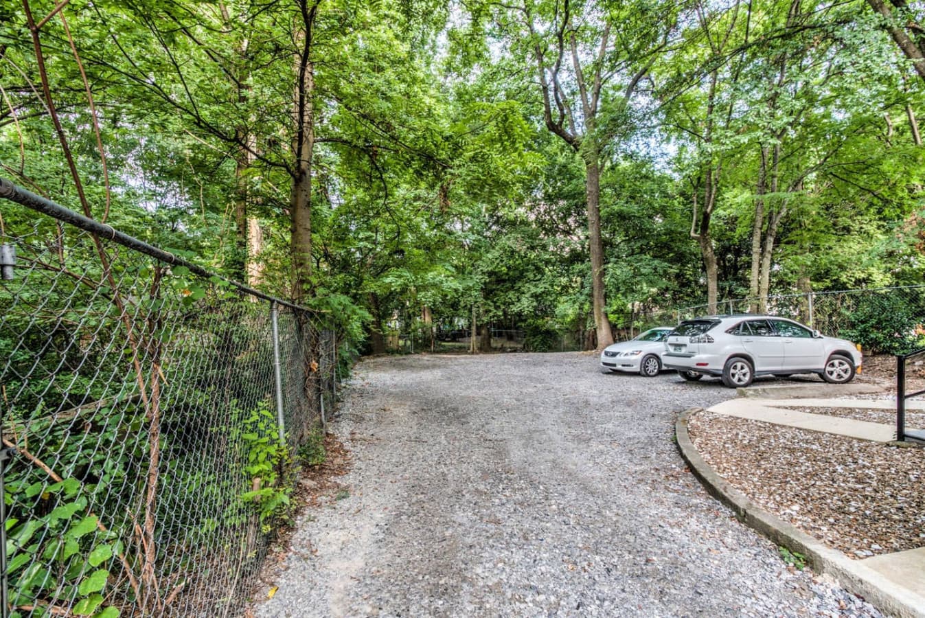plenty of private parking in back and you have your own private entrance from this area