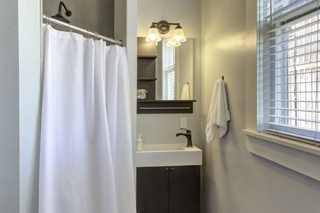 Completely redone bathroom with nice stones on the shower floor that feel wonderful on your feet