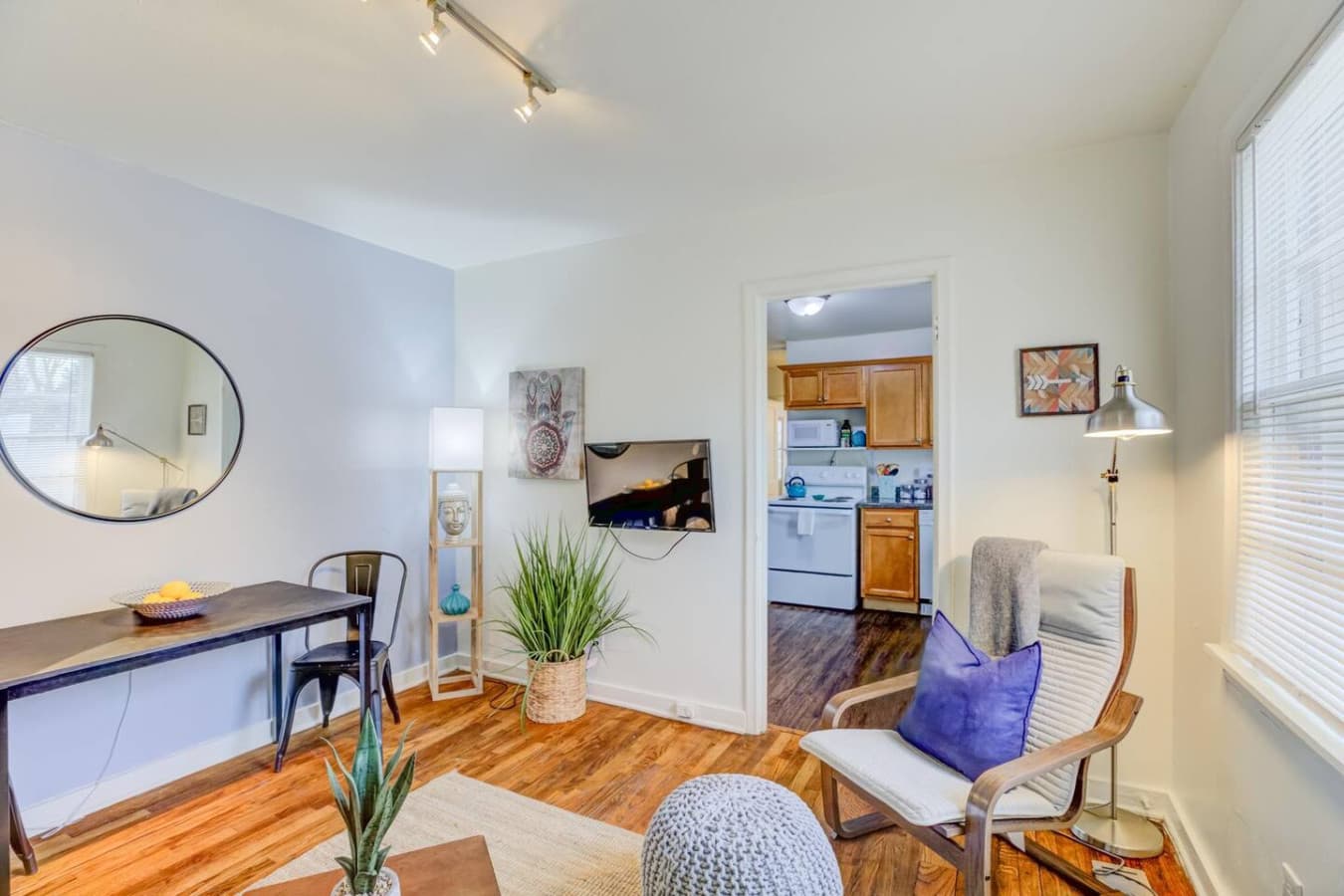 Bright living room with space to relax or catch up with friends.