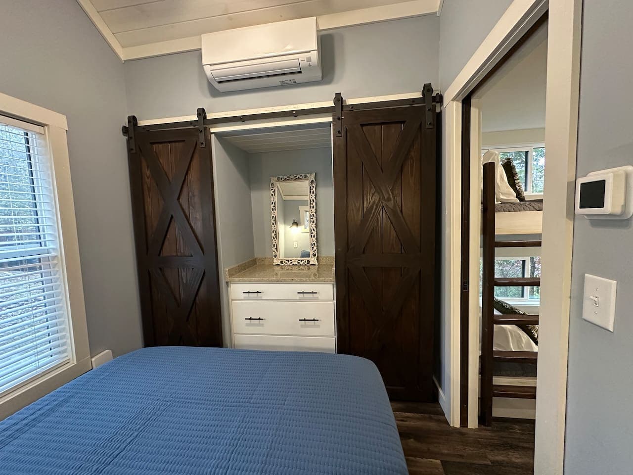 Airy, open, and effortlessly comfortable with a closet space.