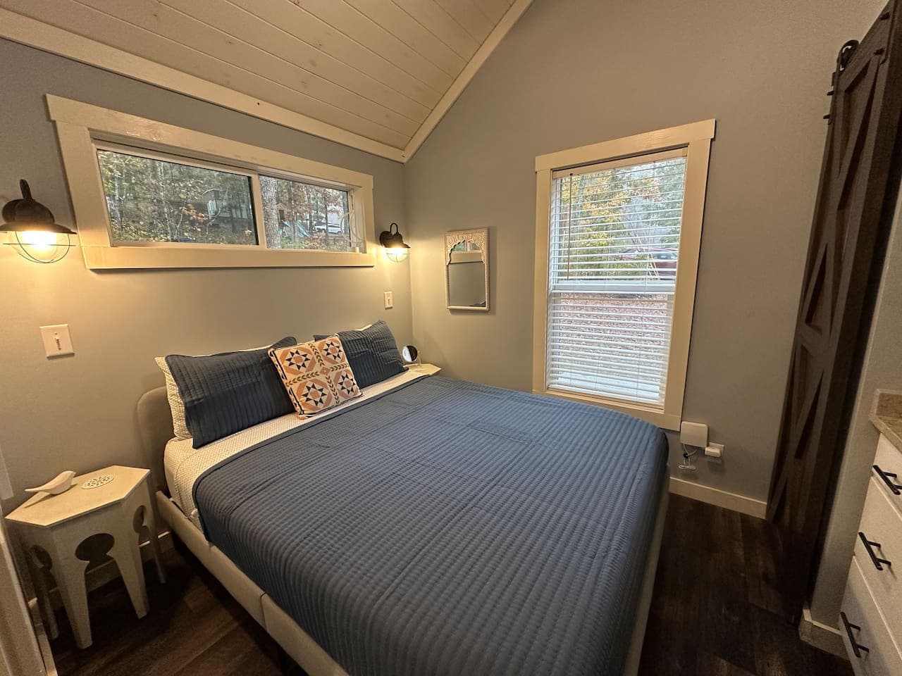 Queen bed with soft linens and calm vibes await.