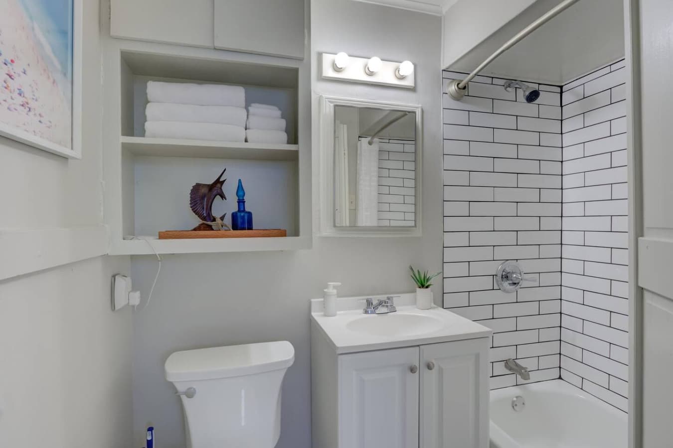 A clean, practical bathroom ready for your stay.