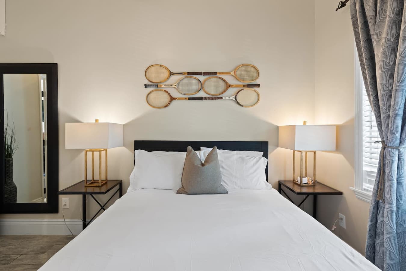 Front bedroom with fresh white linens and a super comfy queen-sized mattress.