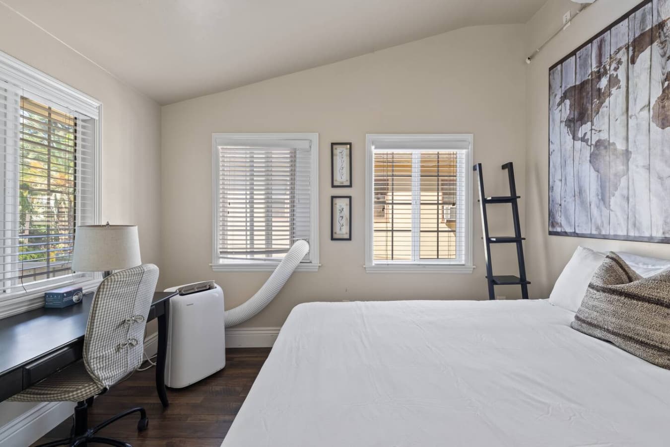 You'll find a nice little work space in the rear bedroom with plenty of natural light streaming in.