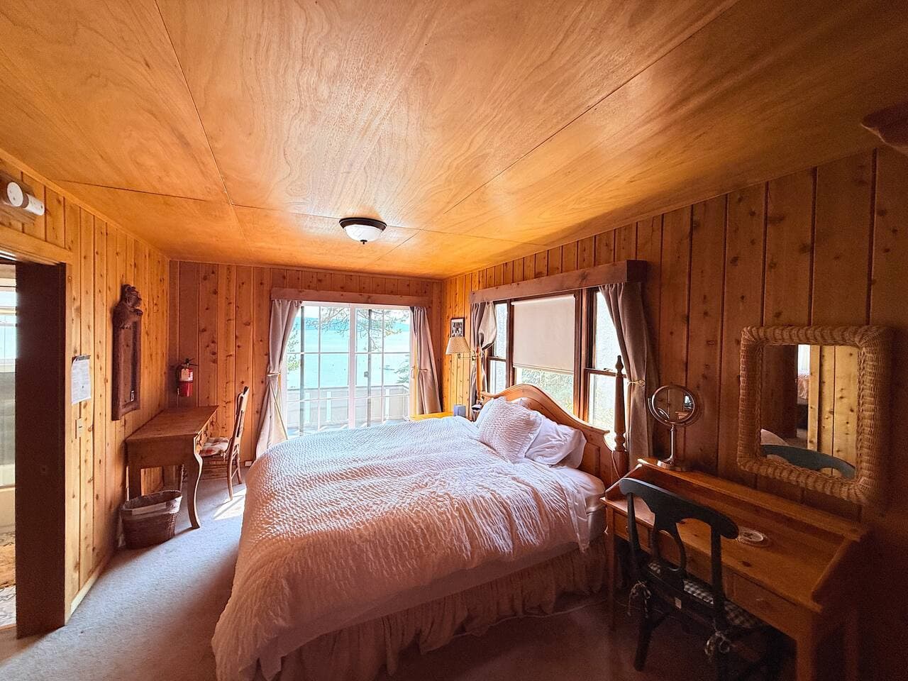 Wake up in comfort and watch sunlight spill across the pines.