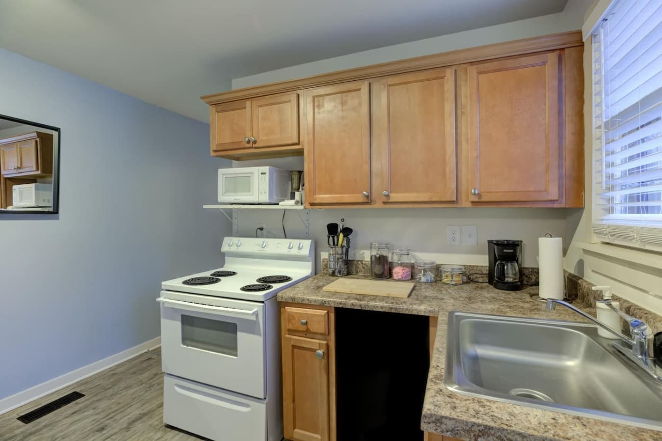 Functional and fully stocked kitchen for your convenience.