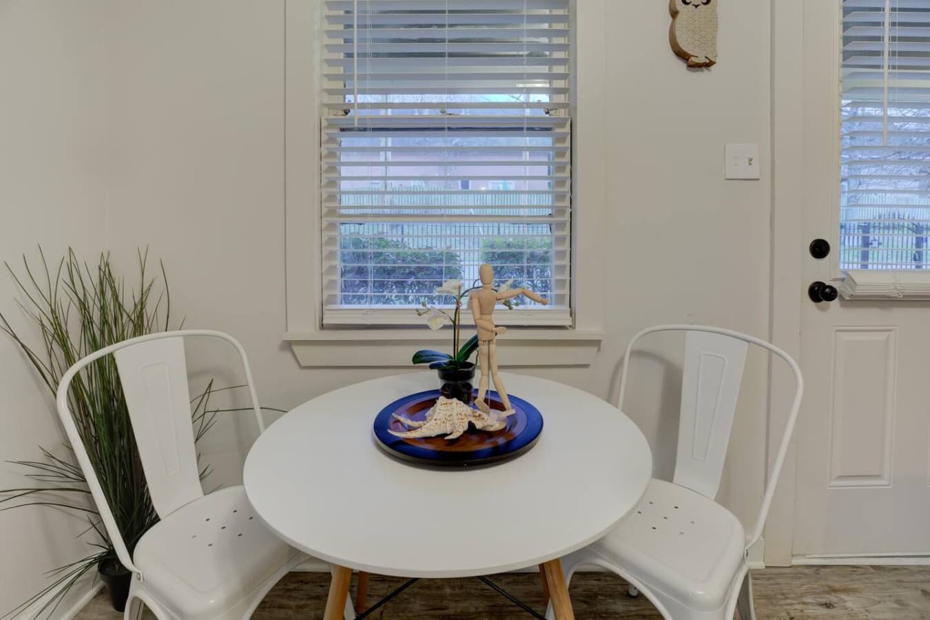 Small and stylish—dining space for two ready for your stay.