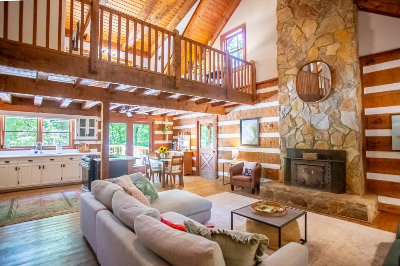 Spacious living room bathed in natural light—perfect for gathering and relaxing.