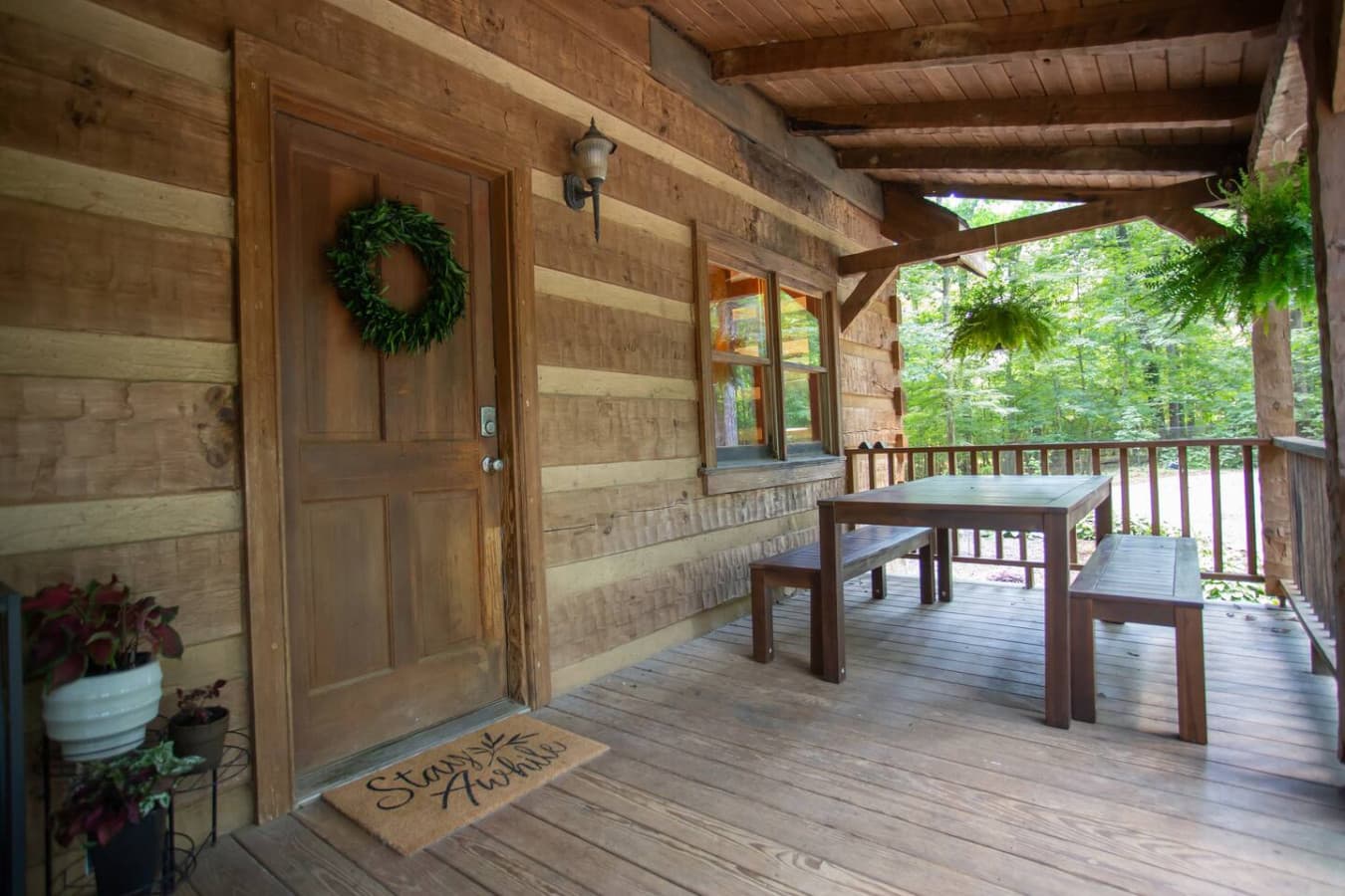 Welcome home—your inviting entrance with a cozy table and bench seating.