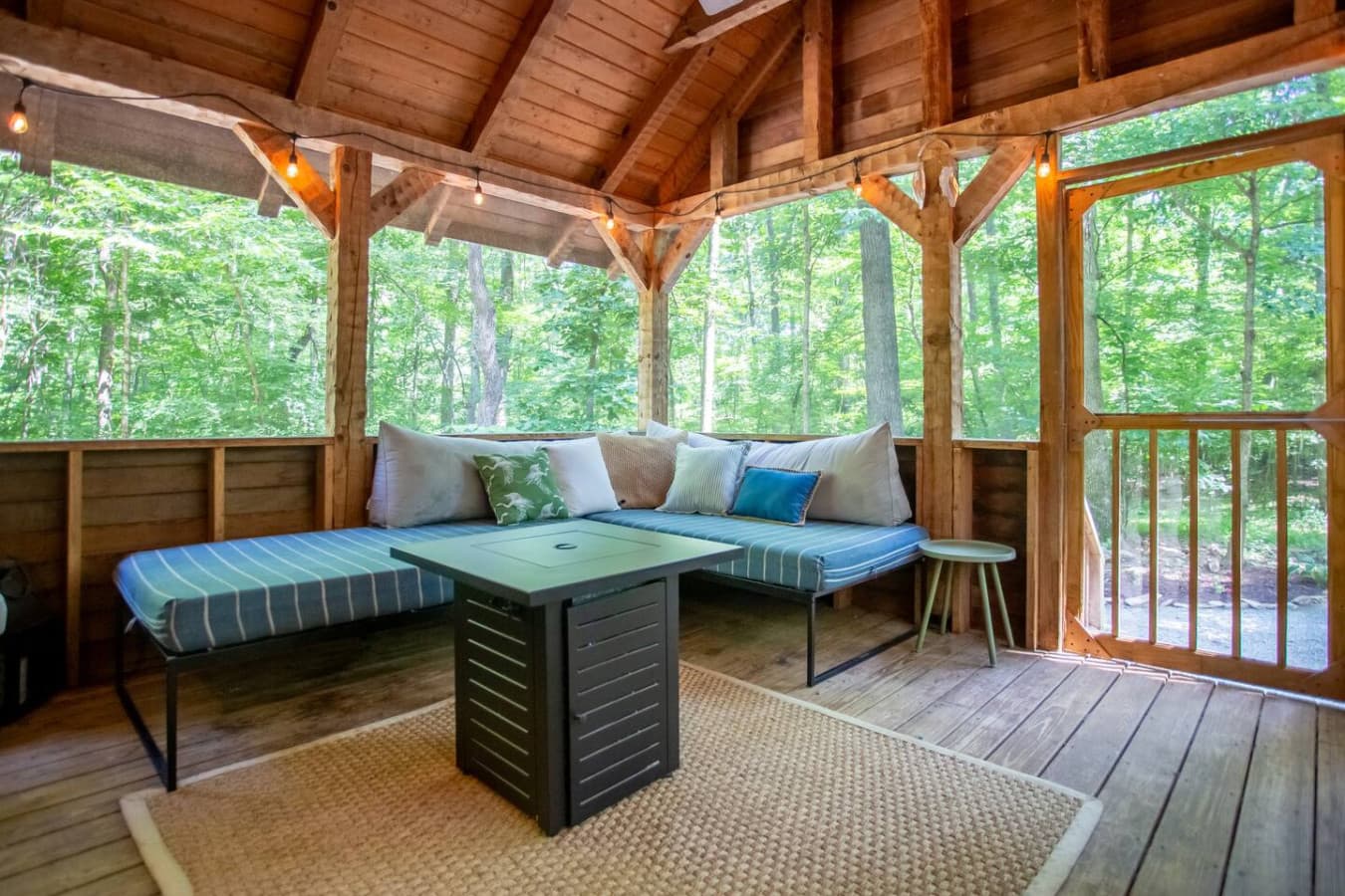 Bring the outside in without the bugs—this porch is your nature escape.