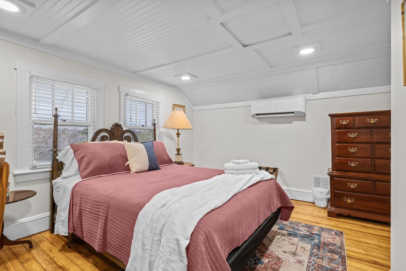 Cozy up in this queen bed after a day exploring town and wake up to the warmth of sunlight coming through