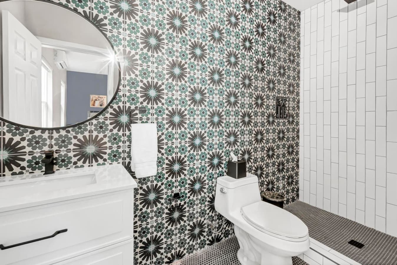 A stylish, well-equipped bathroom designed for two guests with all the essentials for a comfortable stay.