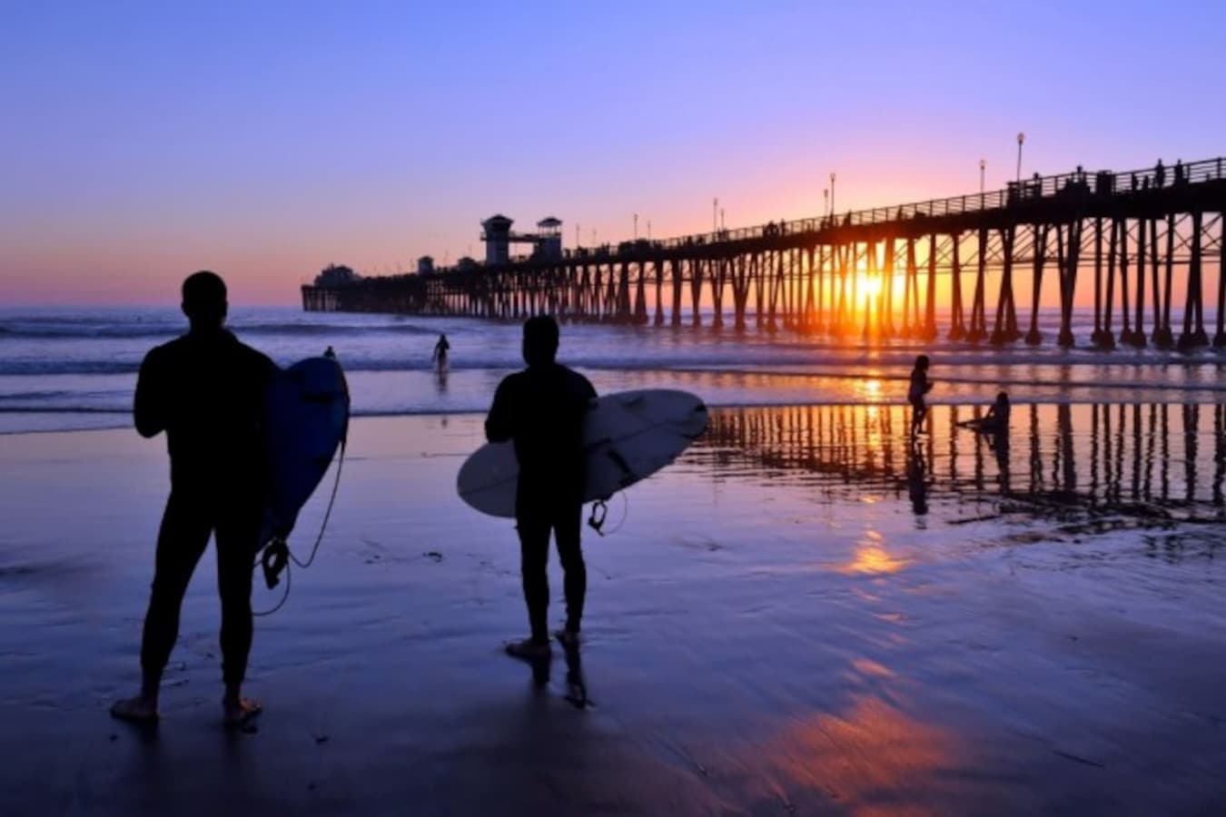 Watch the sky light up with vibrant colors at Oceanside Pier, the perfect spot for a sunset stroll, only 15 minutes from your stay!