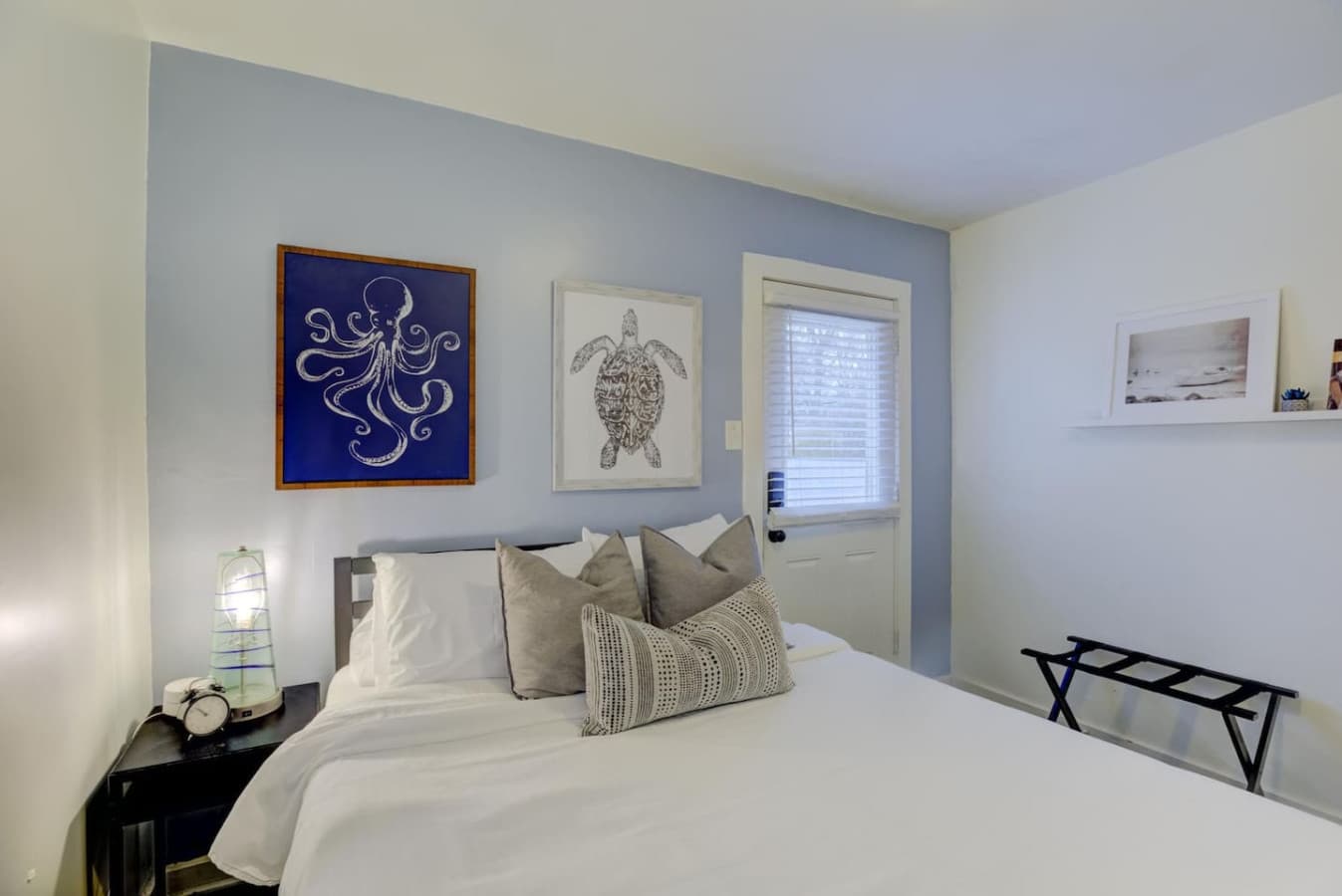 Queen bed ready for sweet dreams and restful nights.