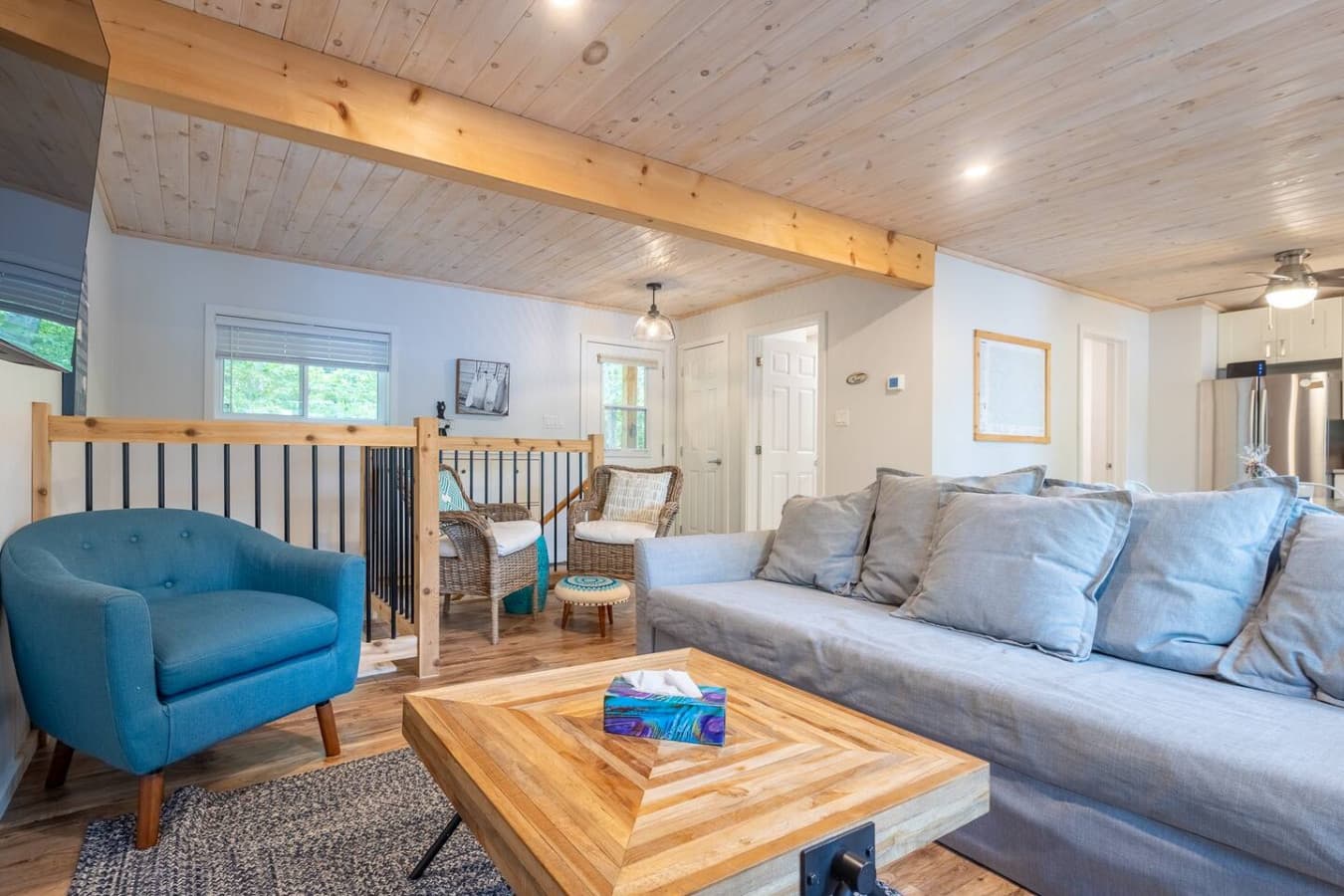 Kick back in a bright, open living room made for slow mornings and easy evenings.