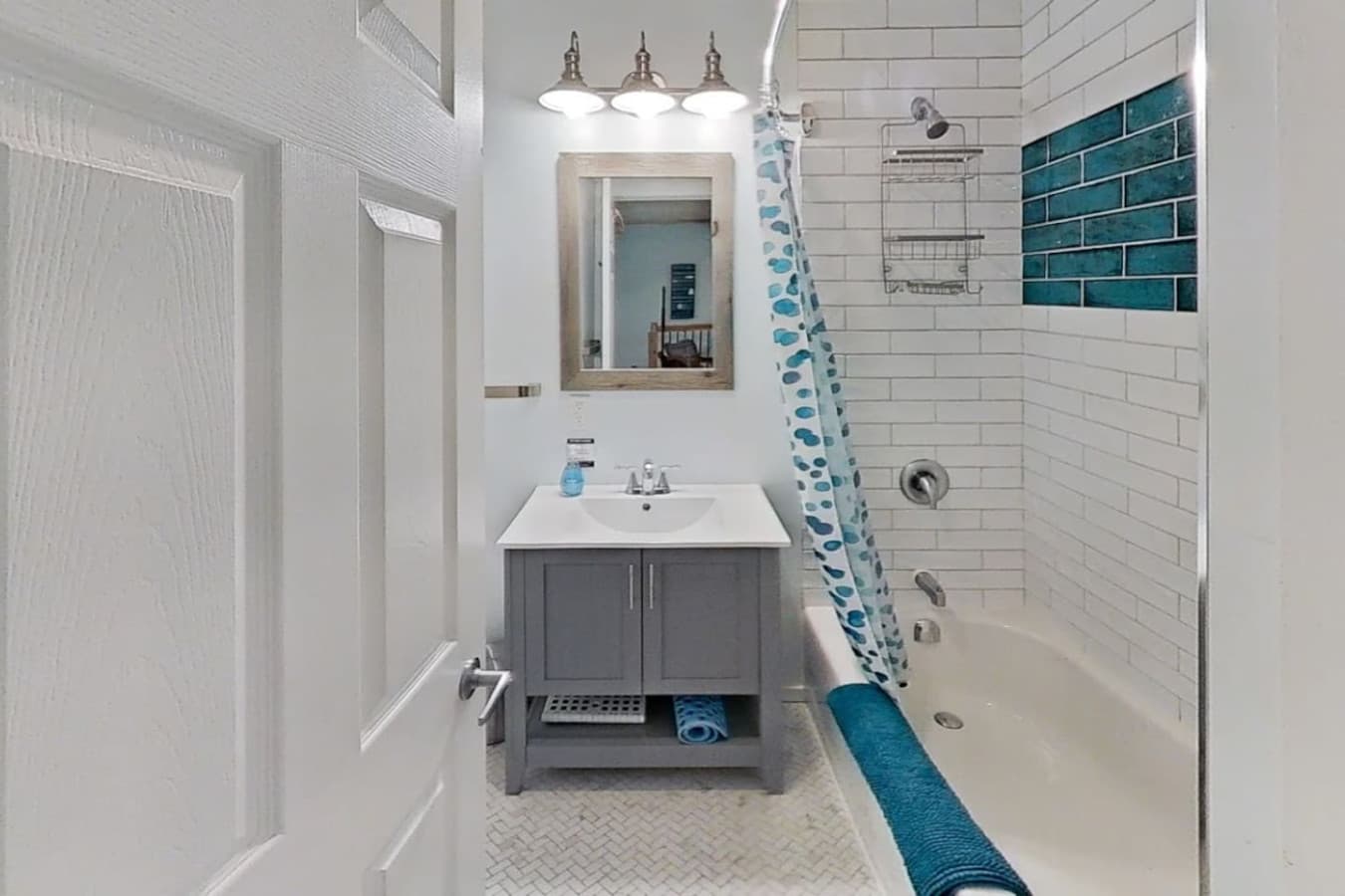 Bright and clean with modern fixtures—everything you need for your morning or evening routine.