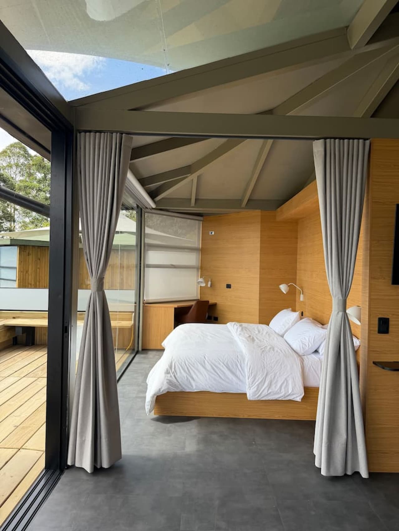 Drift off in a cozy king bed after a day of exploring Medellín’s vibrant city.