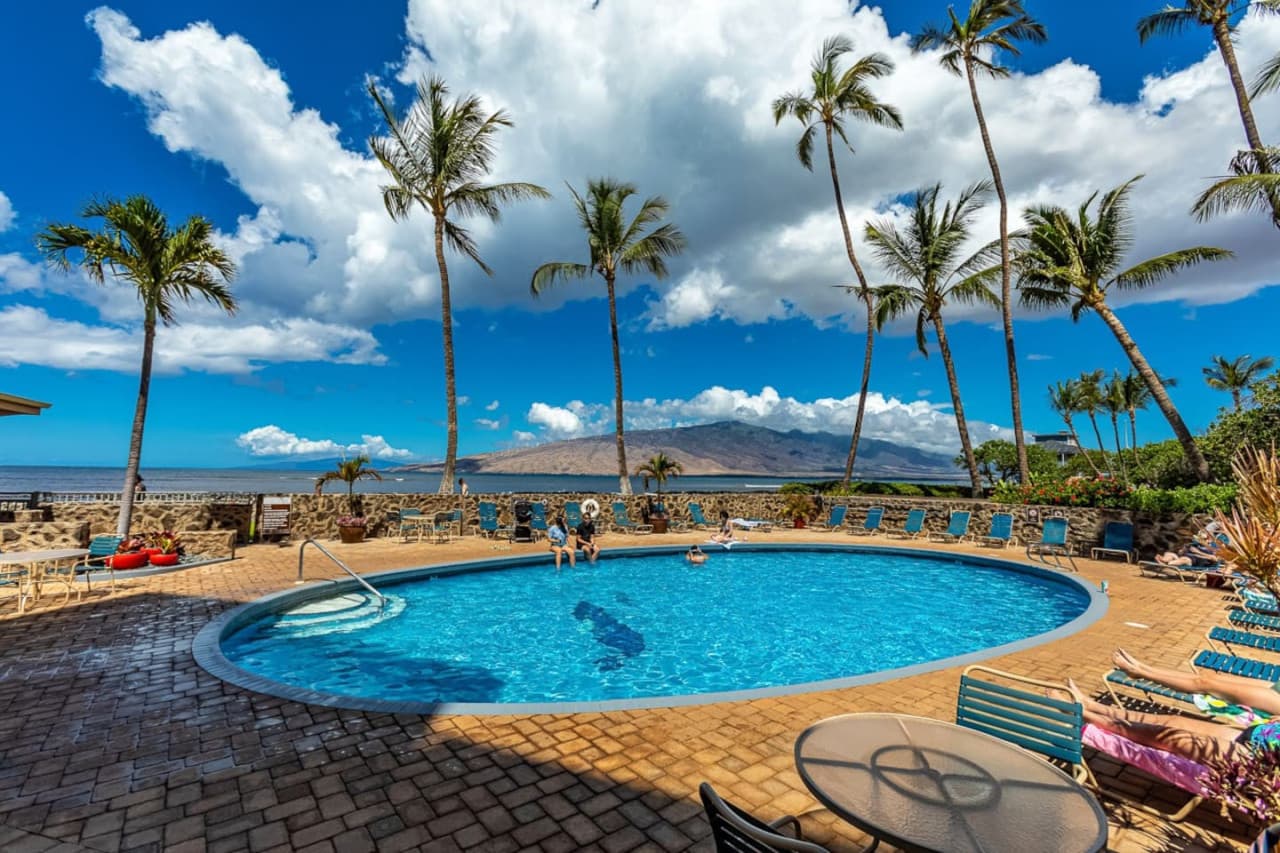 Cool off our heated pool, with stunning views of the ocean and hills.