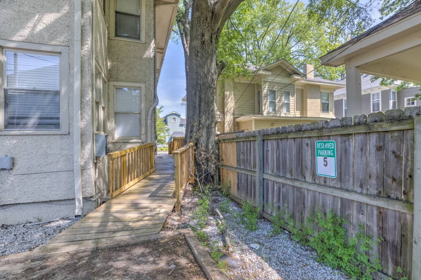 Private rear entrance via the wood deck, plus reserved parking for your convenience.