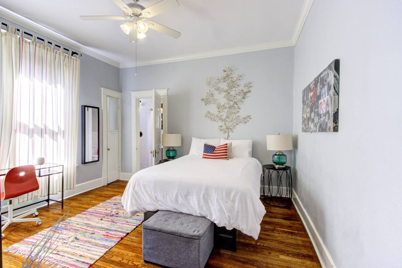 Bedroom has a queen bed and is flooded by natural light during the day, also has a nice desk to get some work done.