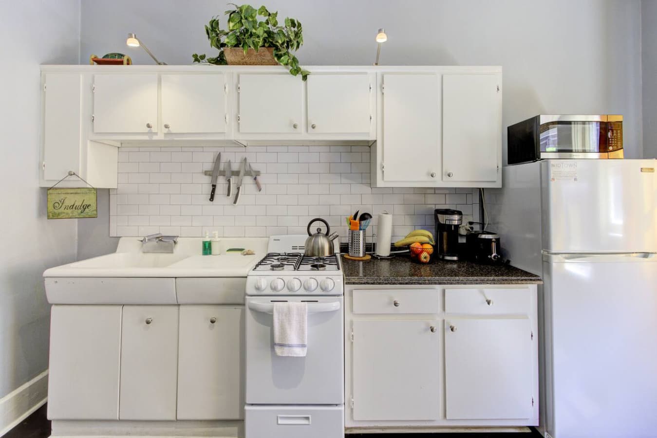 Efficient, compact kitchen with all the essentials for cooking and dining in style.