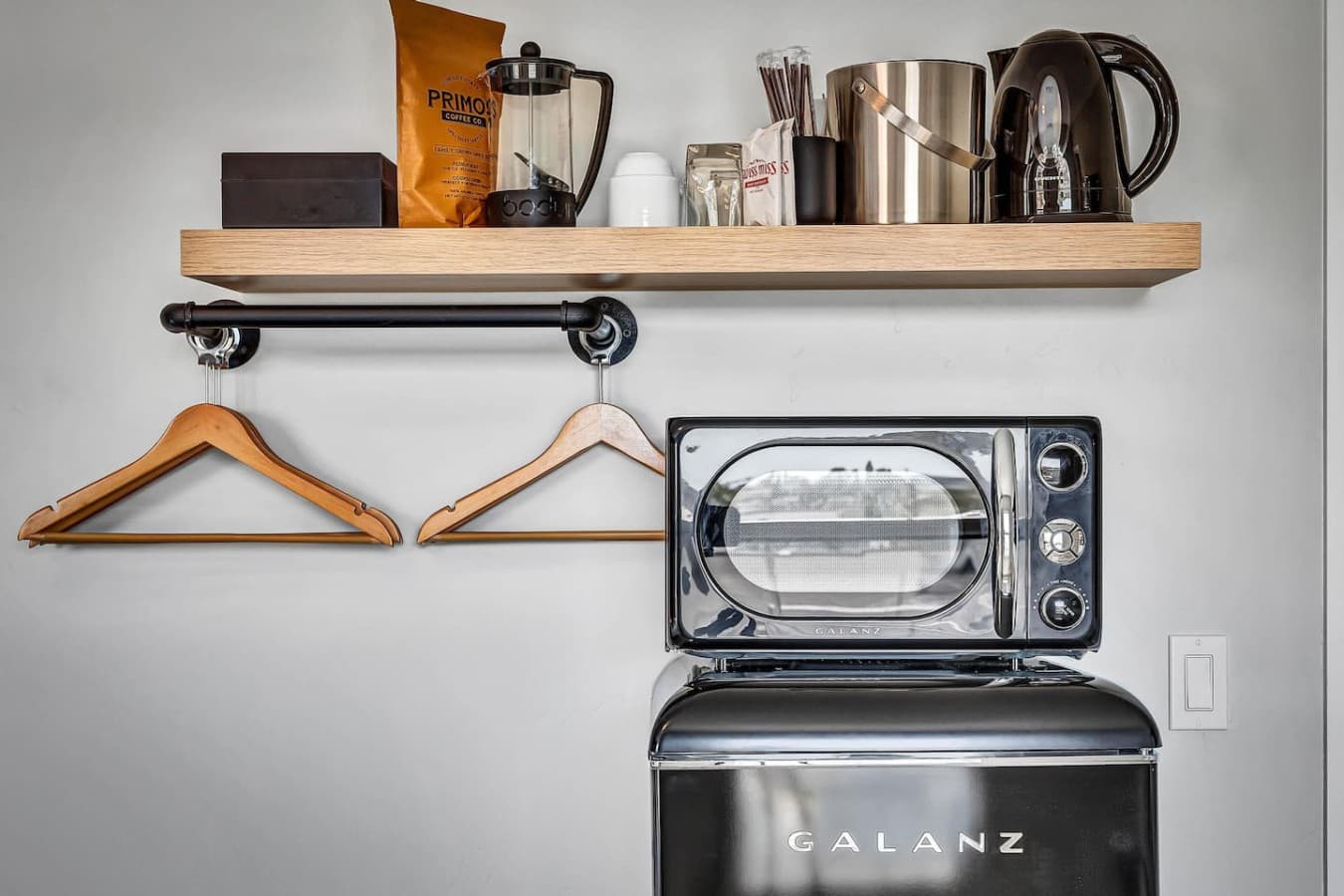 Convenience at its best—microwave, fridge, and coffee station all in one spot! ☕️