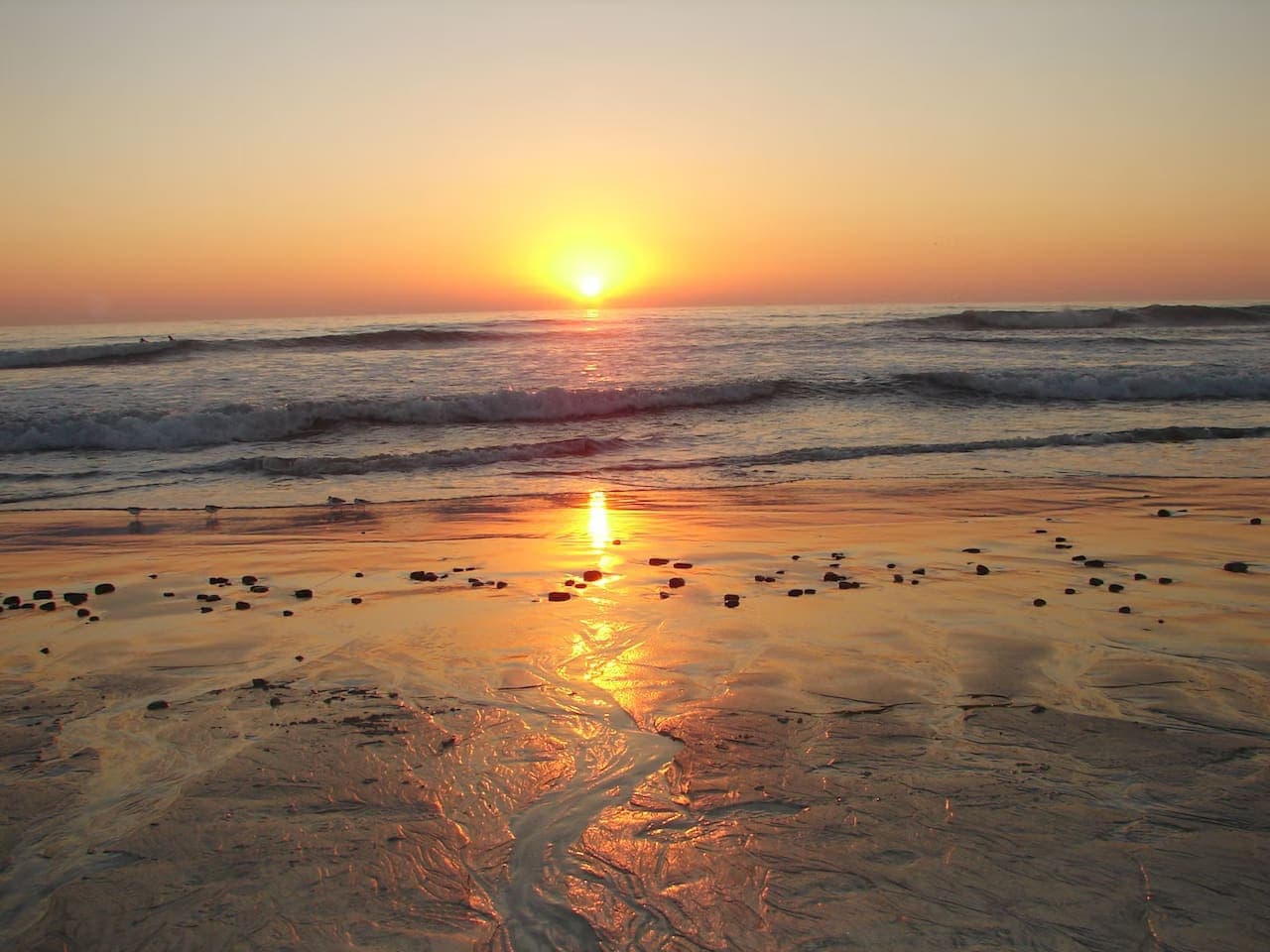 Chasing sunsets in Carlsbad—where the sky meets the sea in perfect harmony.
