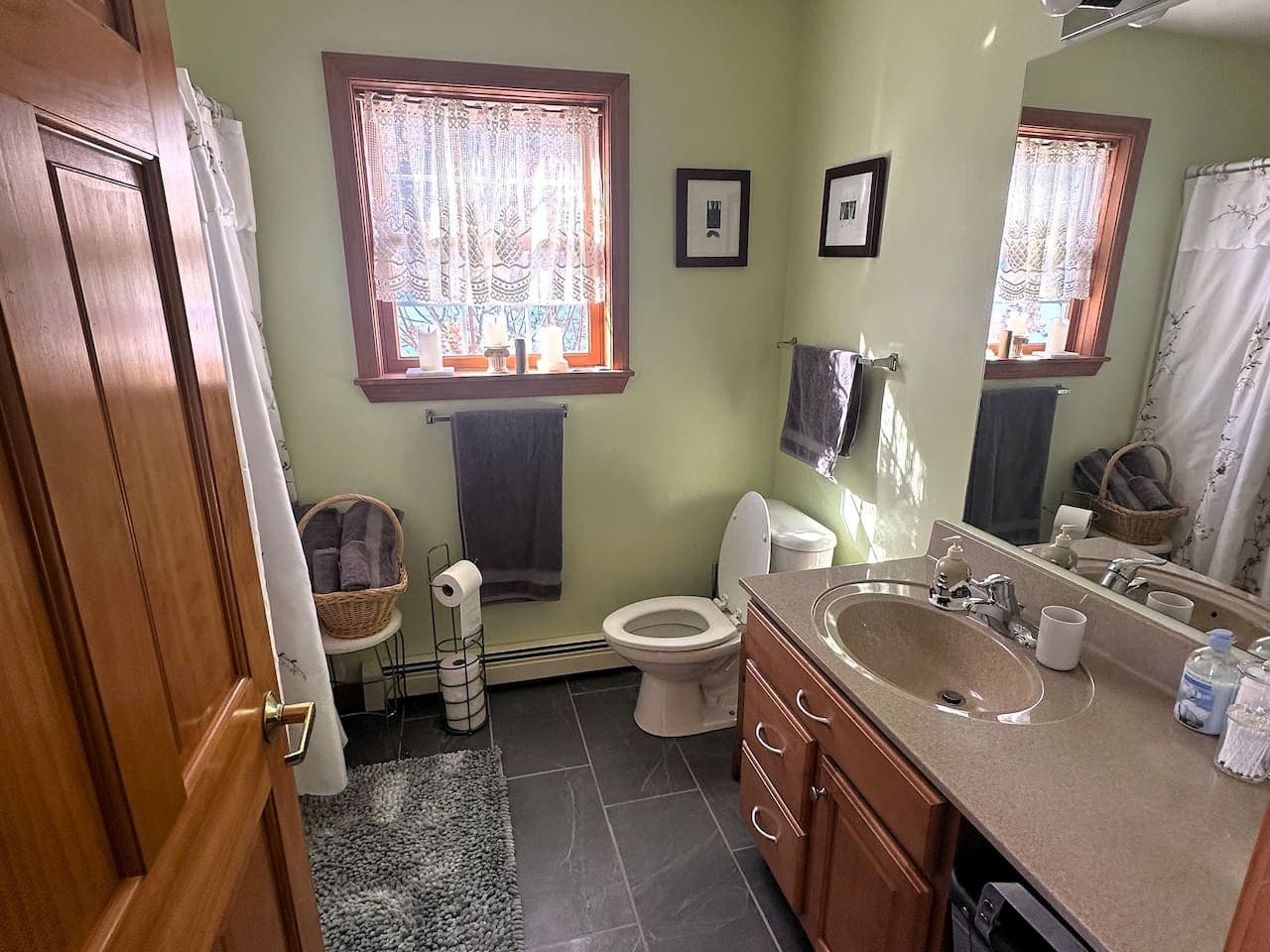 Clean, bright space stocked with fresh towels.