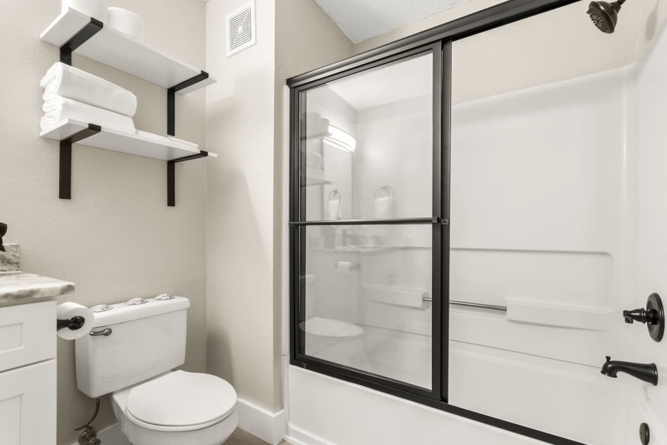 Your personal spa retreat! Relax and refresh in this full bathroom, complete with a bathtub, soft towels, and all the essentials.