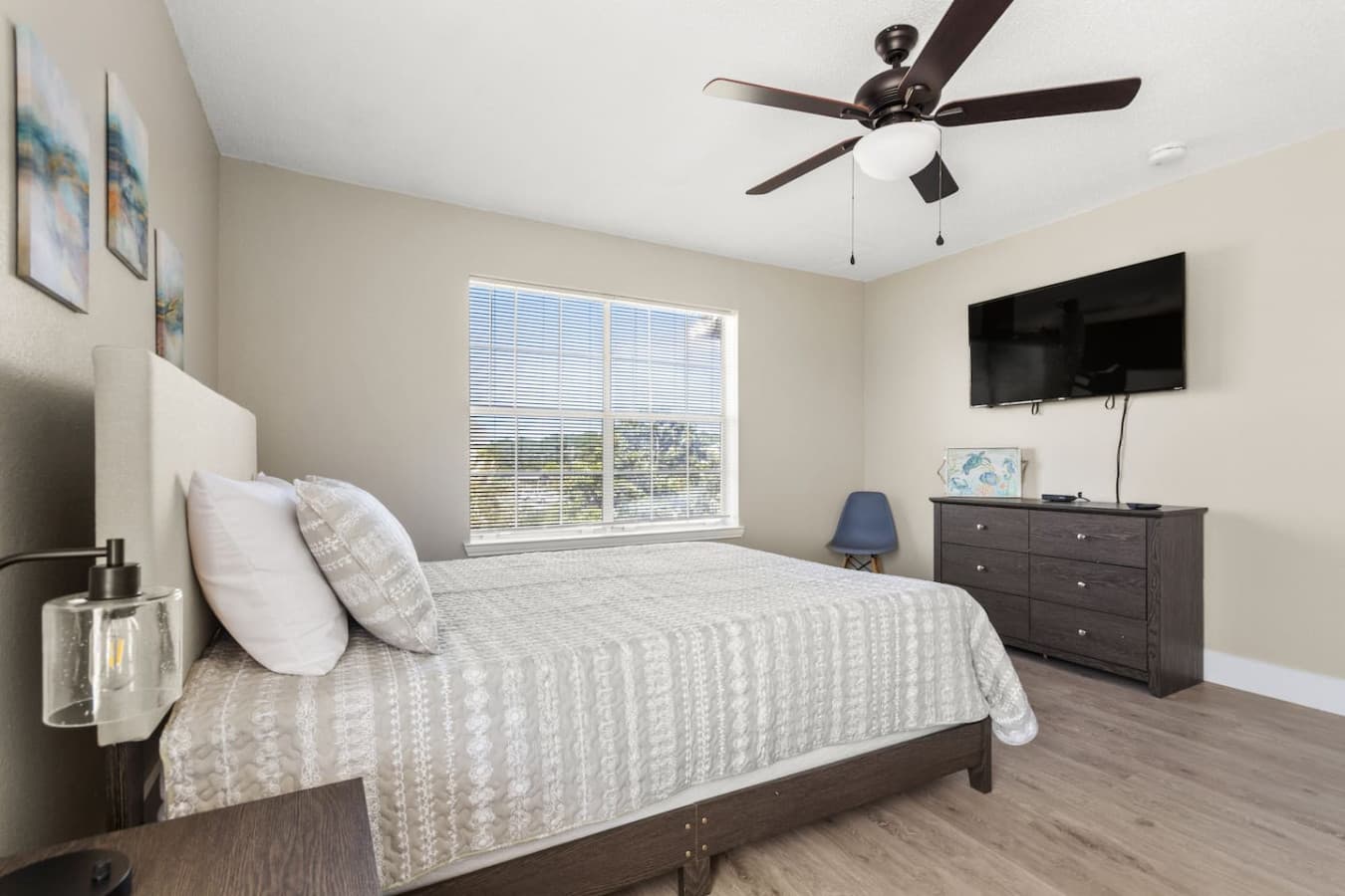This spacious bedroom with a queen bed is the perfect place to relax and recharge.