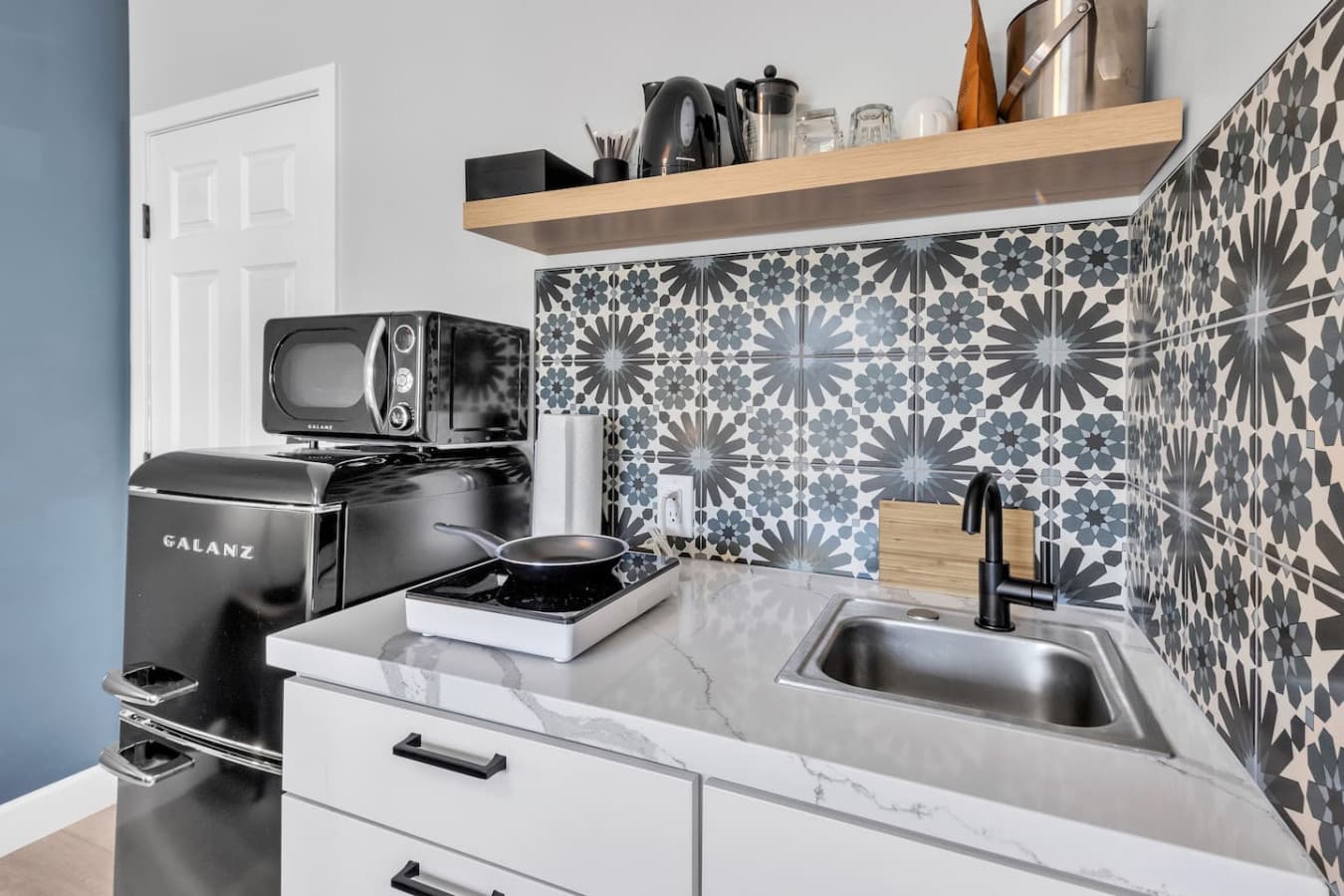 Cook your own meals in your kitchenette with cooking basics and appliances: microwave, stove, refrigerator