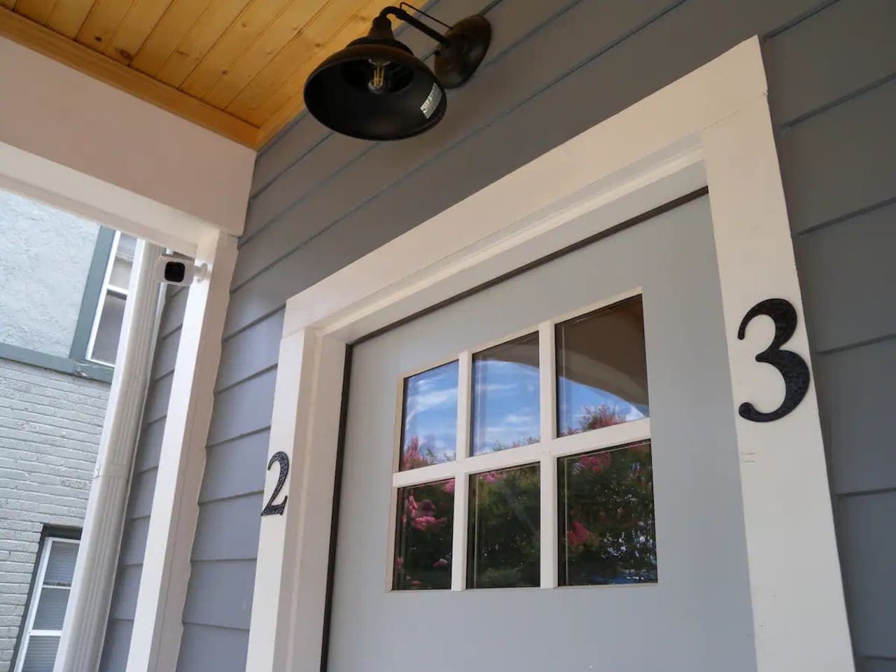 You'll share an entrance with the next unit but you will have full privacy to your unit!