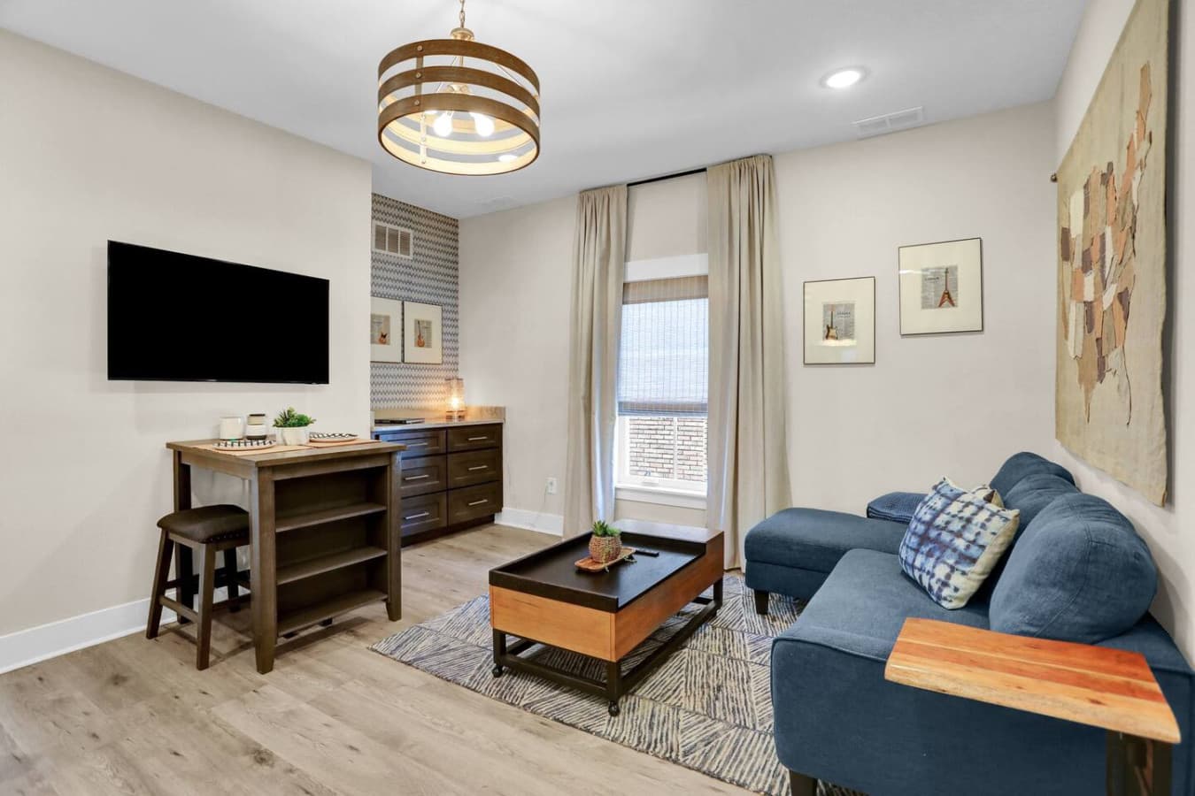 The living room couch doubles as a lounge by day and a comfy bed by night. The sofa bed turns into a full bed