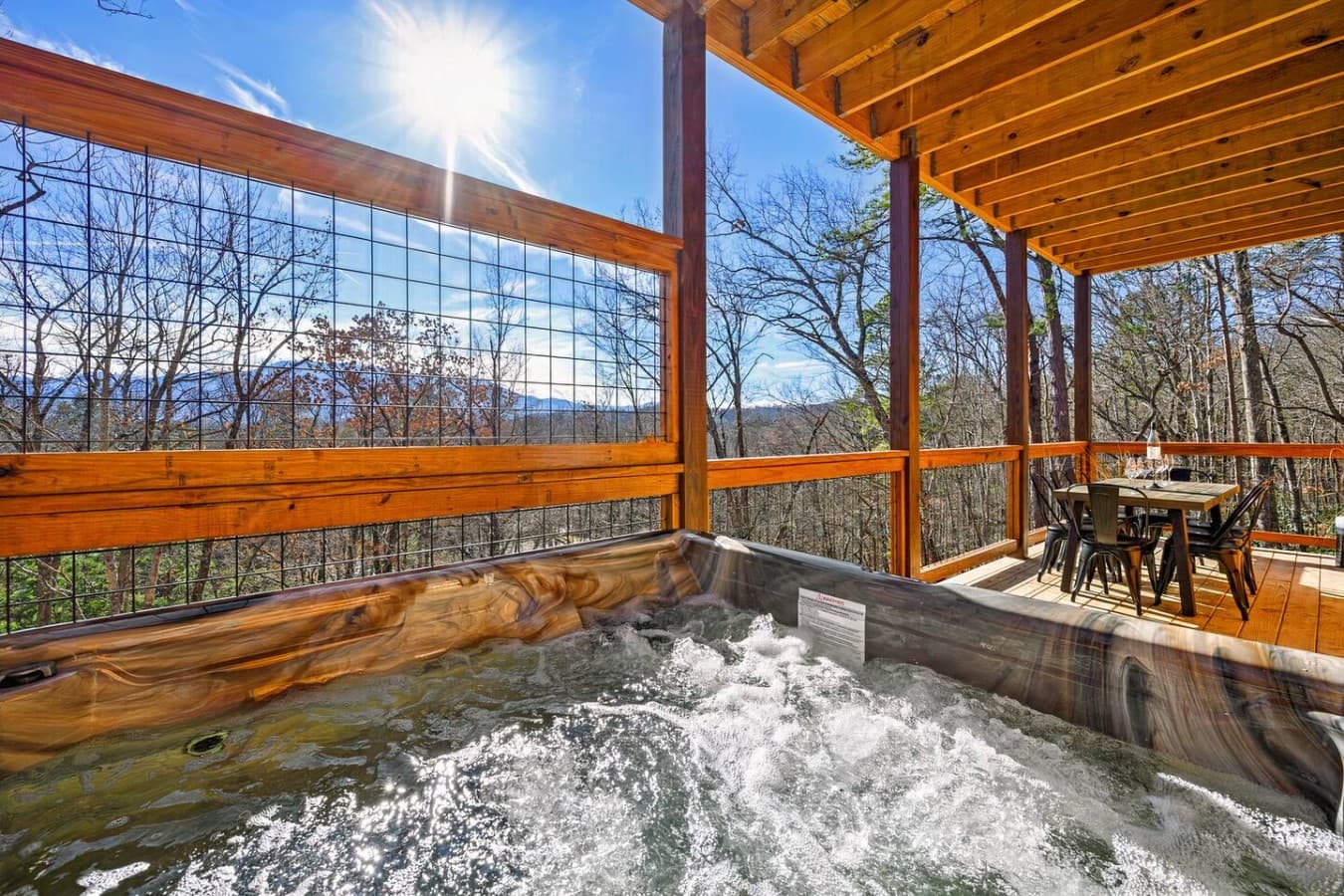 Soak it All In – Who says you can't enjoy the great outdoors while staying warm? A hot tub, fresh air, and epic views—life is good!
