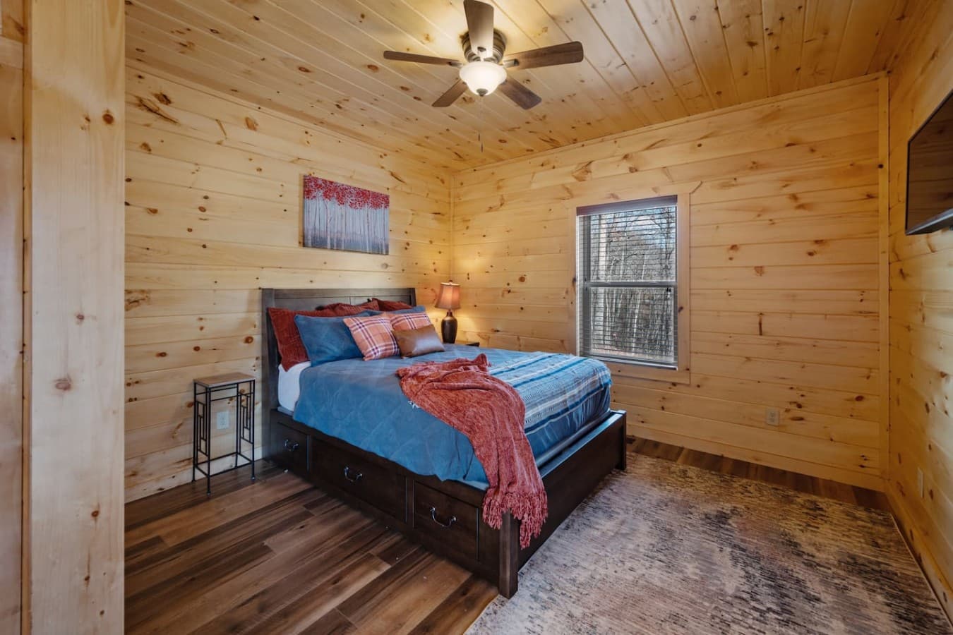 Sleep Like a Log (Cabin) – This king bed is as dreamy as the mountain views outside.