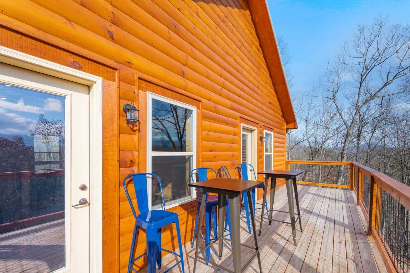 Take a Seat, Enjoy the View – The mountains are calling, and this balcony has the best seat in the house. High chairs, a table, and views for days!