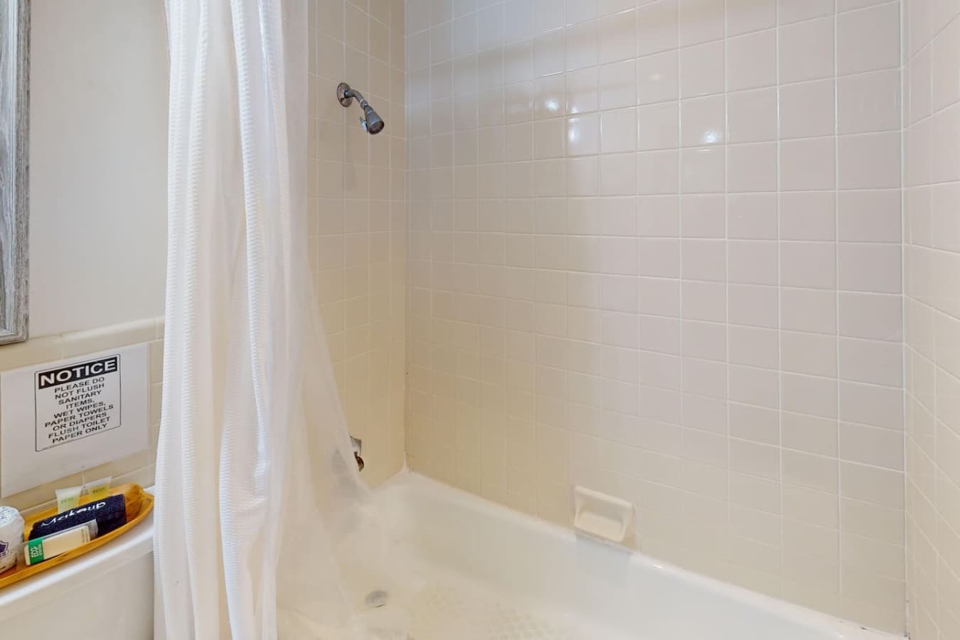 Stocked with soft towels and essentials for a comfortable stay.