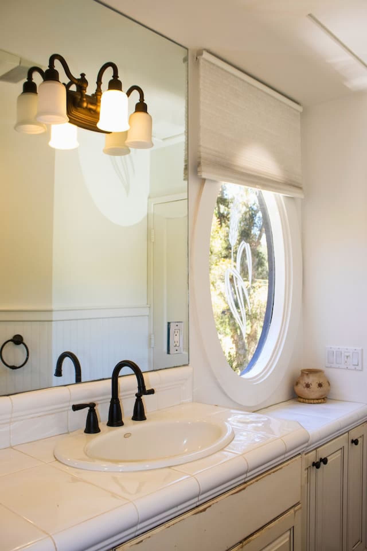 Master bathroom featuring a spacious shower, a separate bath tub, modern vanity, and plenty of storage, offering a serene space to refresh and relax.