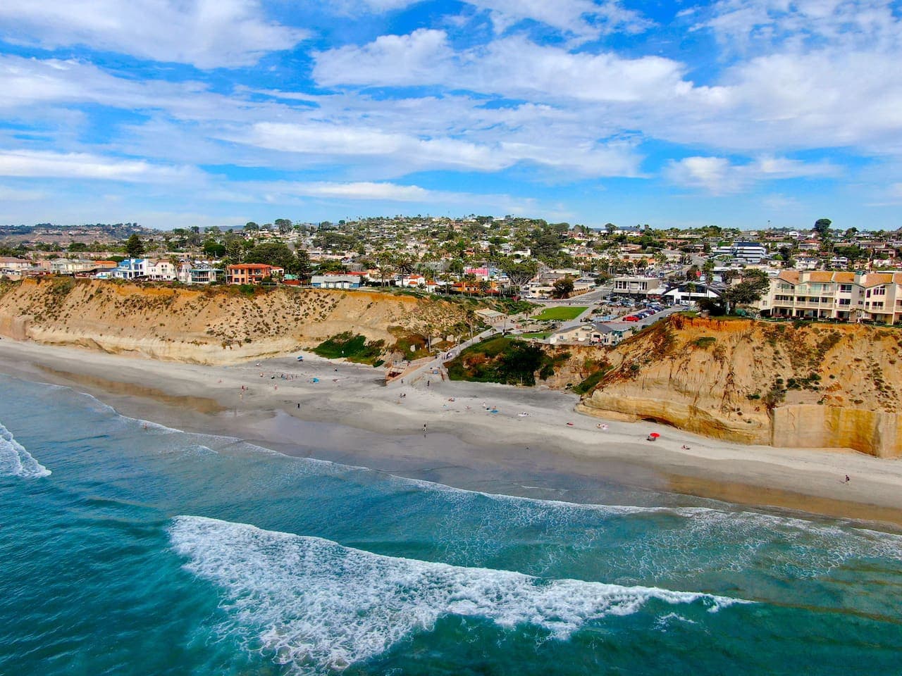 Solana Beach – 25 min drive. A laid-back beach town with a beautiful coastline, fun shopping spots, and great places to eat.