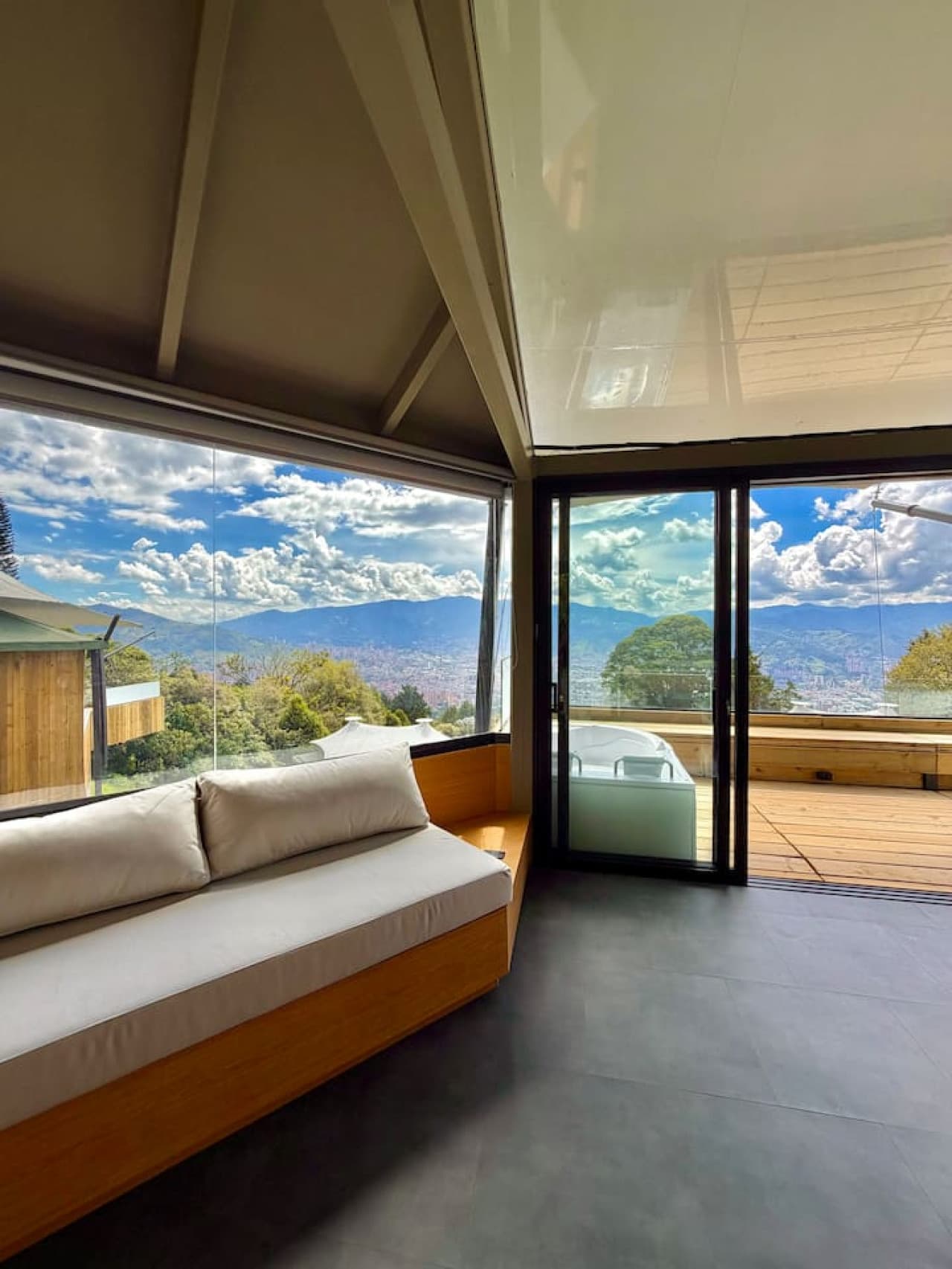 Relax in a bright, open living space where modern design meets panoramic views.