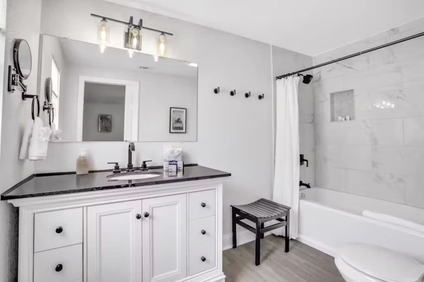 Bathe or shower? Why not both! Your bright, modern bathroom has you covered.