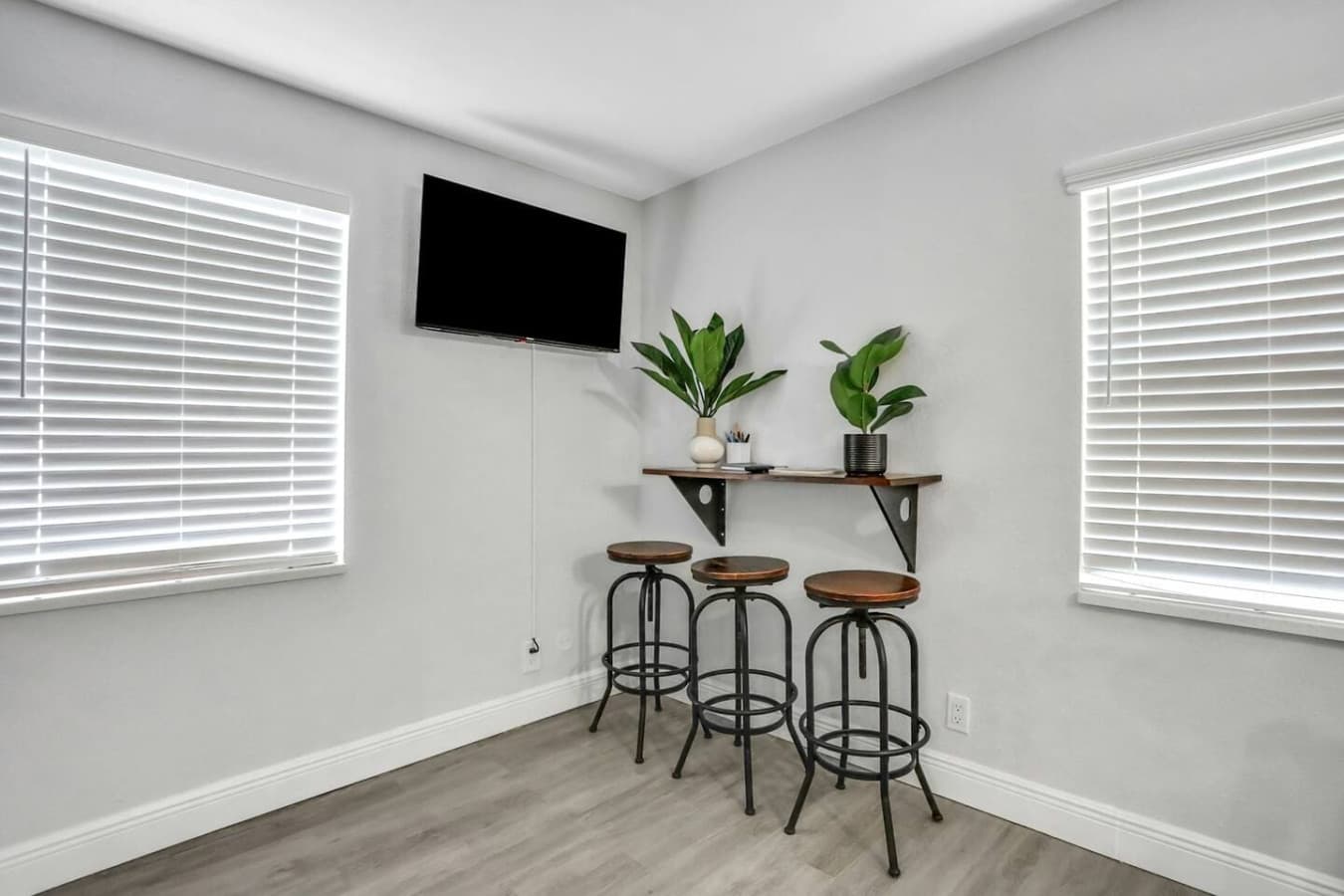 A stylish spot to sip, snack, or catch a show while enjoying the home’s vibrant vibes.