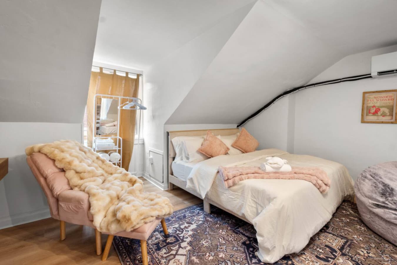 A spacious attic retreat: sleep, work, and daydream above it all.