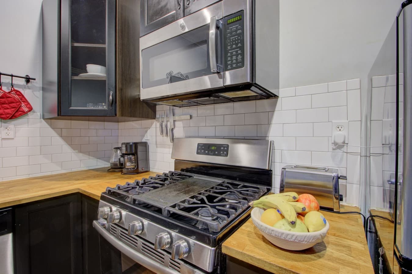 Inviting kitchen setup, ideal for everything from quick snacks to full meals.