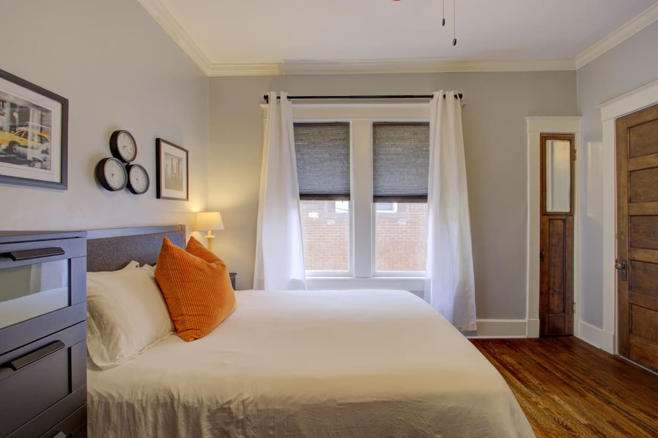 Peaceful bedroom retreat with soft lighting and fresh linens.