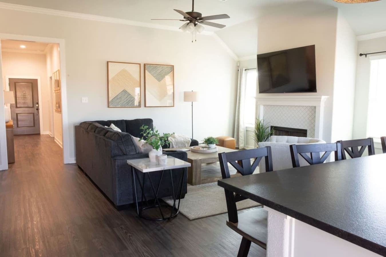 Home is spacious yet cozy. With a large sectional couch, bar stools and the dining space - there is ample seating for everyone to be together.