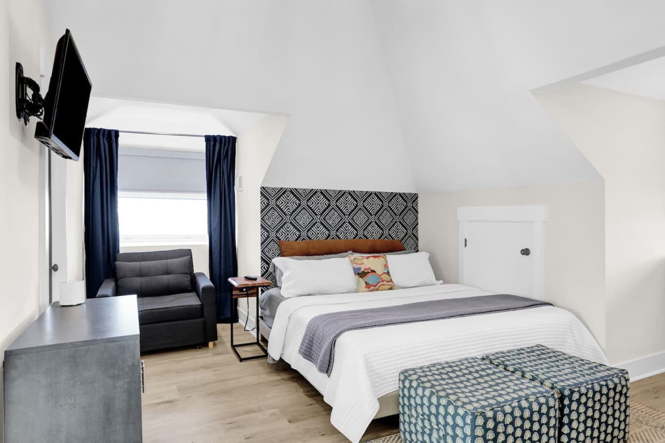 The master bedroom comes with a plush king bed and a comfy single pull out couch. First dibs gets the bigger bed!